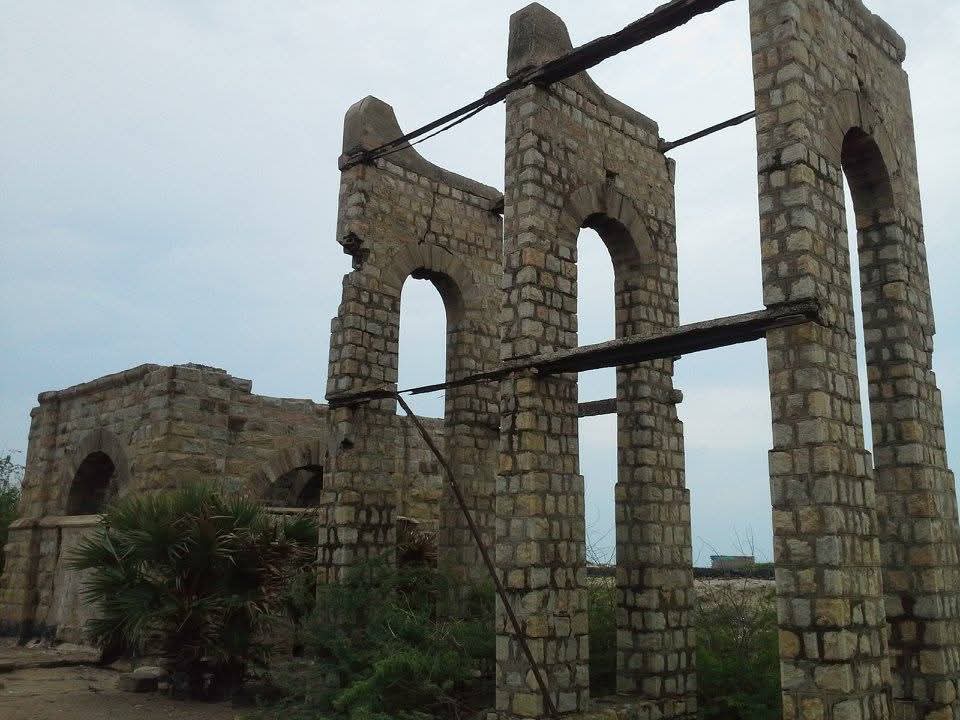 Ruins of Dhanushkoti church with stone arches standing after the 1964 cyclone in the ghost town of Tamil Nadu, India.