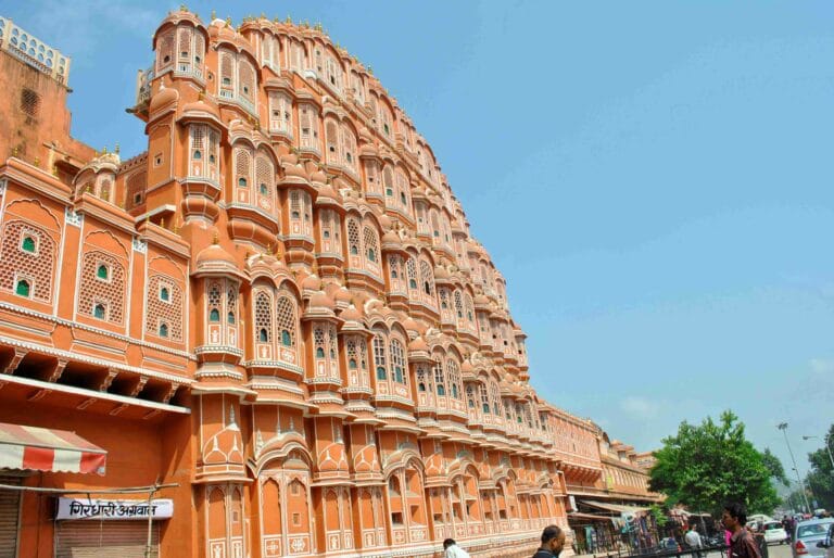 Hawa Mahal, the iconic pink sandstone palace in Jaipur, India, known for its honeycomb-like façade and hundreds of small windows.