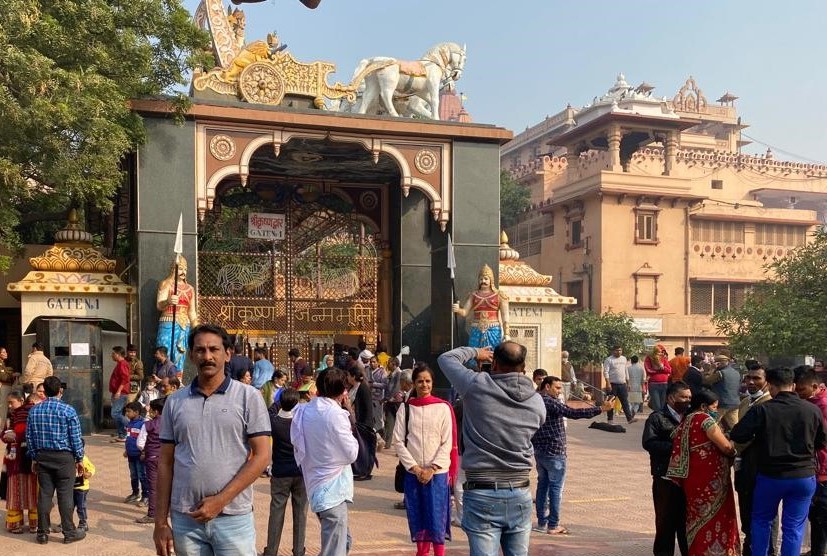 Devotees gathered at the entrance gate of Shri Krishna Janmabhoomi Temple, Mathura, Uttar Pradesh, India – the birthplace of Lord Krishna