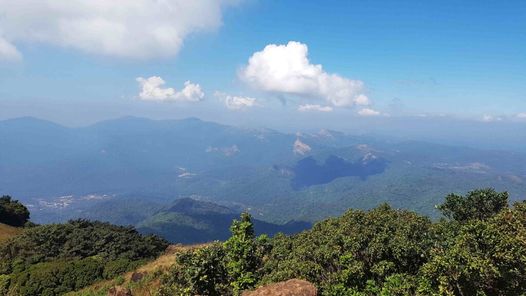 Clouds casting shadows over the valleys and mountains on the Kudajadri trail
