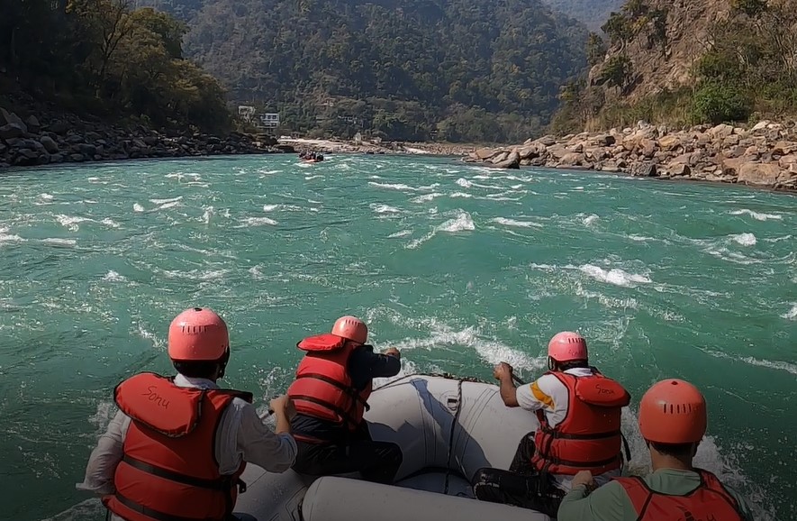 River rafting through ripples of the Ganga in Rishikesh