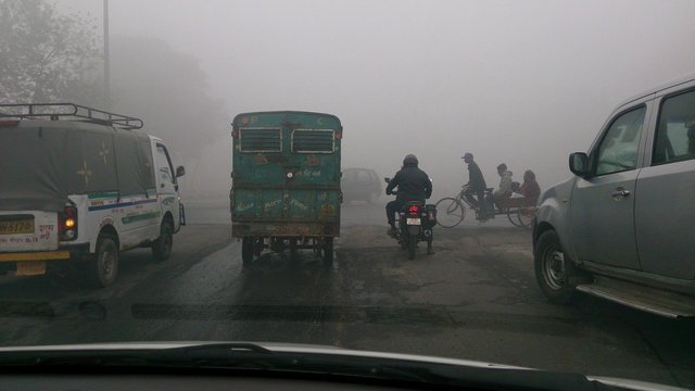 Delhi winter fog traffic street photography