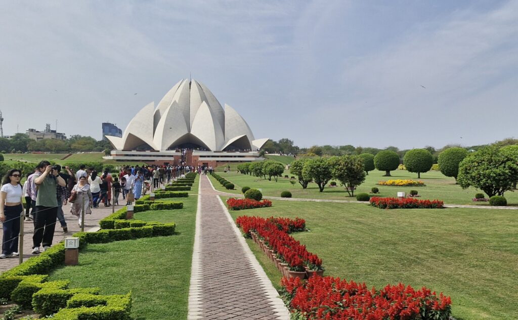 Lotus Temple Bahai House of Worship in New Delhi with garden pathway