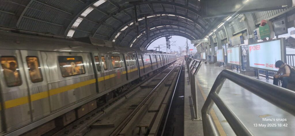 Delhi Metro train inside station platform in New Delhi