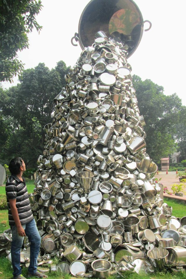 Modern art installation made of metal utensils at National Gallery of Modern Art New Delhi