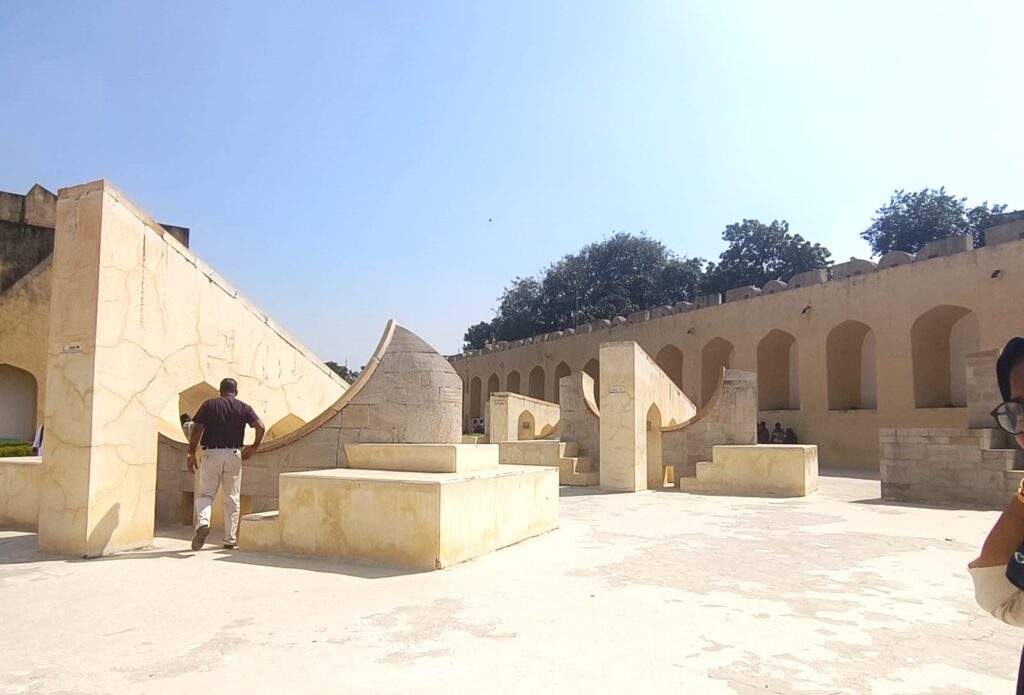 Jaiprakash Yantra at Jantar Mantar Jaipur — ancient astronomical instrument with curved stone structures used for celestial observations and time measurement