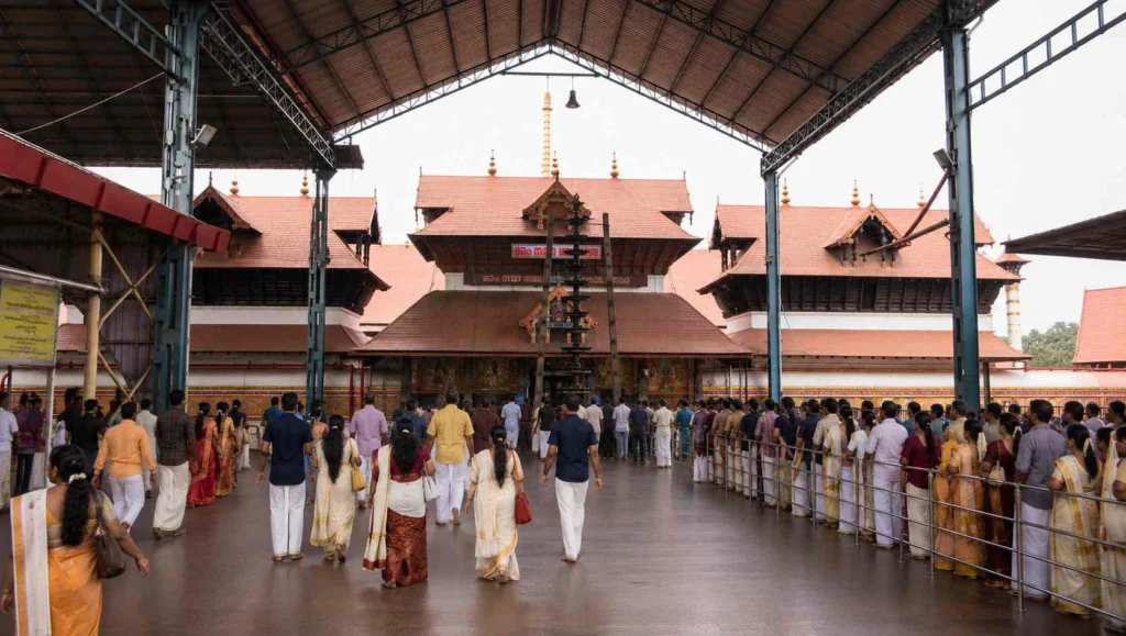Devotees waiting outside the majestic Guruvayur Sri Krishna Temple in Kerala